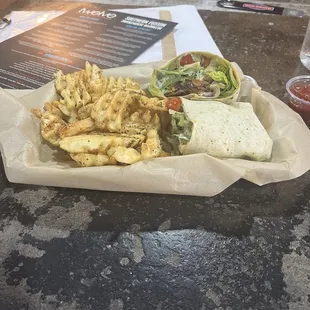 Veggie wrap and waffle fries