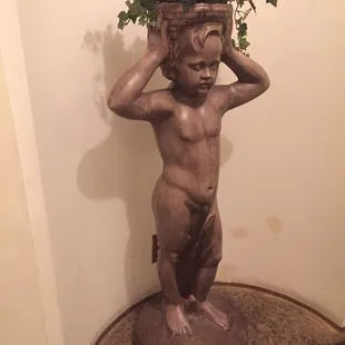 Love this sculpture on the staircase.