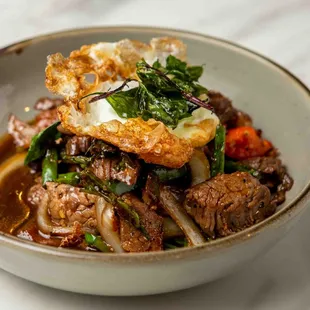 a bowl of beef and vegetables