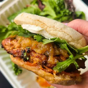 Turkey burger with whipped goat chz, arugula, tomato jam, and caramelized onion! It's wonderful.