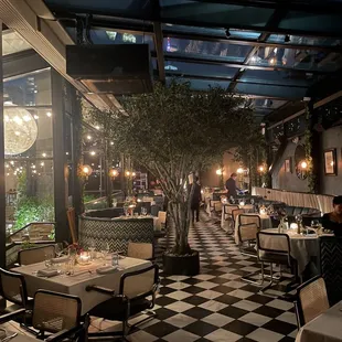 a restaurant with a checkered floor