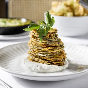a stack of crackers on a plate