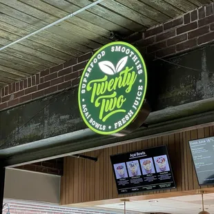 a neon sign for twenty two