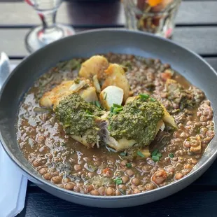 Roasted Golden Tile Fish, carrot top chimichurri, braised lentils with smoked pork and vegetables