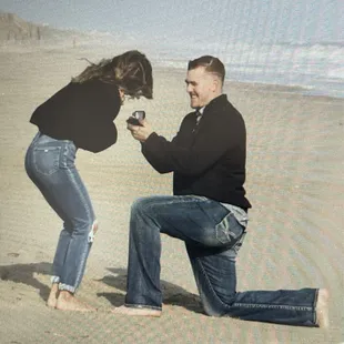 The beach was easily accessible from the house (he popped the question right as she came off the deck)