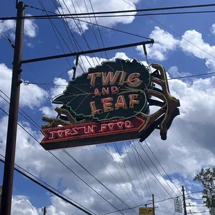 a neon sign for a restaurant