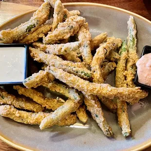a plate of fried asparagus