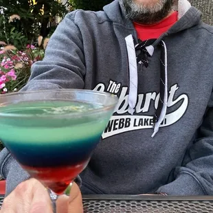 My husband sampling a seasonal cocktail.