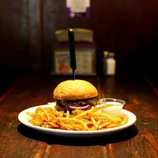 Bacon cheese burger with fresh ground beef, crisp red onions, tomato and lettuce. Hand cut French fries and homemade ranch.