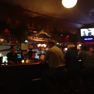people sitting at a bar