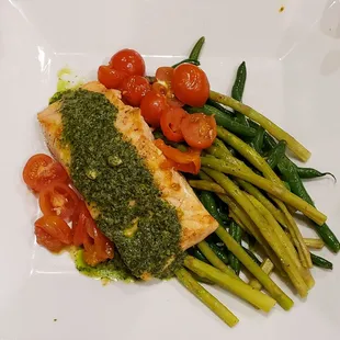 a plate of fish and asparagus