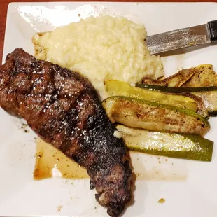steak, mashed potatoes, and asparagus