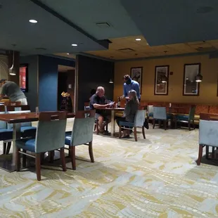 Our server helping another couple