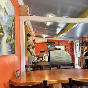 Inside view of cash wrap from our table. Our table was backed up to stock room &amp; restroom area