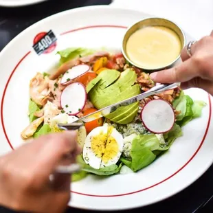 a person eating a salad
