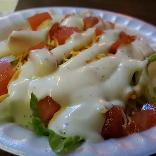 Side salad with steak dinner. I love the divey Styrofoam for a bowl!!