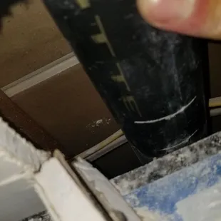 Installer cut into pvc pipe behind wall when cutting drywall to adjust the granite countertops. Another angle.
