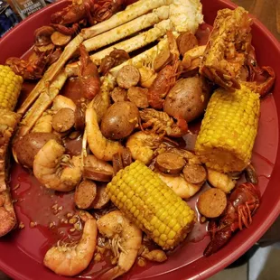 This was the seafood combo. (Serving tray in mine) it had lobster, shrimp, sausage,  crab, crawfish, potatoes,  and corn.