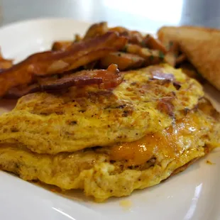 Omlette, Bacon, and Toast.  All cooked to order, just for you!