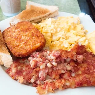 4 egg breakfast with hashbrowns and corned beef hash