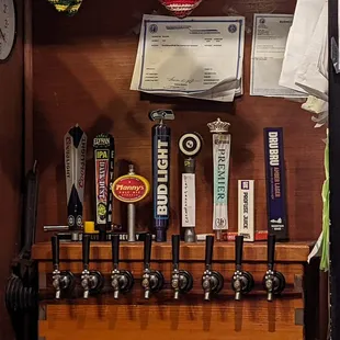 Draft beer taps.