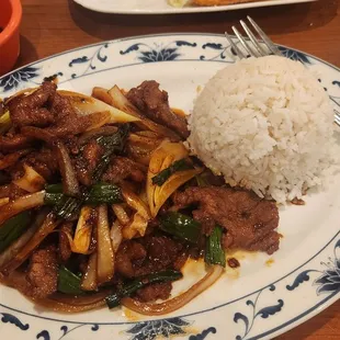 Mongolian beef. And crab Rangoon in the back