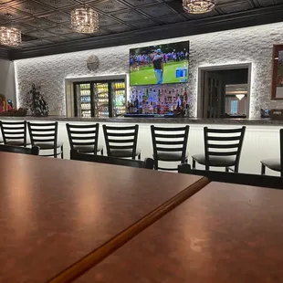 TV&apos;s every where.  Empty bar