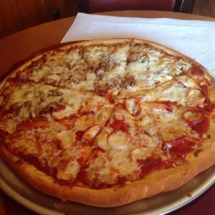 Half pepperoni and half sausage