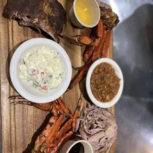 a platter of meat and sides