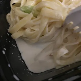 The watery sauce with one lonely piece of onion