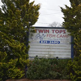 a sign for twin tops fish camp