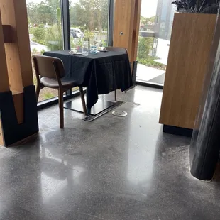 Back corner table for two with floor vent