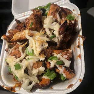 Loaded fries with jerk chicken