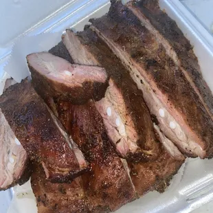 ribs in a plastic container