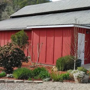 a red building with a metal roof