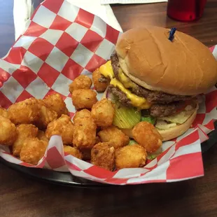 Double cheese burger with tots.