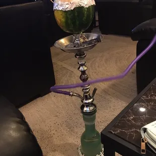 a watermelon in a vase
