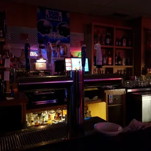 a bar with a lot of bottles