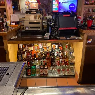 bar counter with liquor bottles