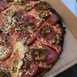 Pepperoni and Jalapeños!  Look at those crispy edges!  Delicious!