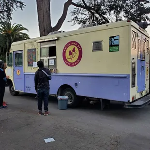 a food truck parked on the side of the road