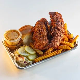 TWIST HOT TENDERS BOX
two large tenders with fries, house slaw, pickles, a kona roll, and two dipping sauces