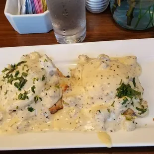 Biscuits with bison gravy and poached eggs.  So savory!