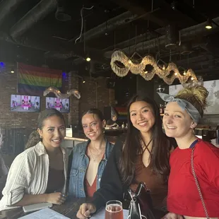 a group of women sitting at a table