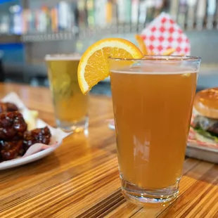 a burger and a glass of beer