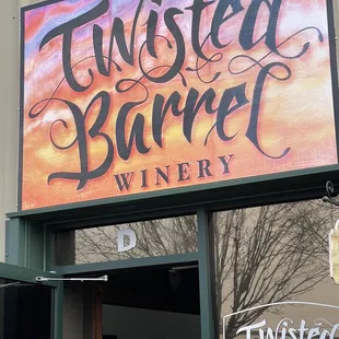 a sign for twisted barrel winery