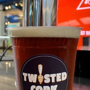 a beer in a plastic cup