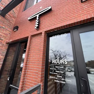 the entrance to hours