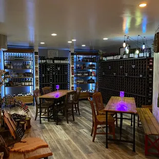 a wine cellar with wine bottles on shelves