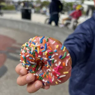 Rainbow sprinkles glazed cake donut